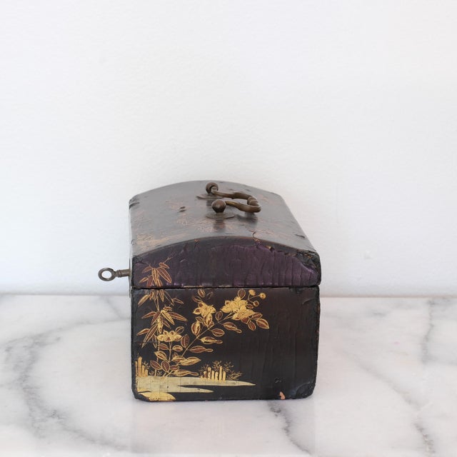Absolutely stunning antique Chinese tea caddy box. This one has the prettiest scene I believe that I have ever seen. Comes...