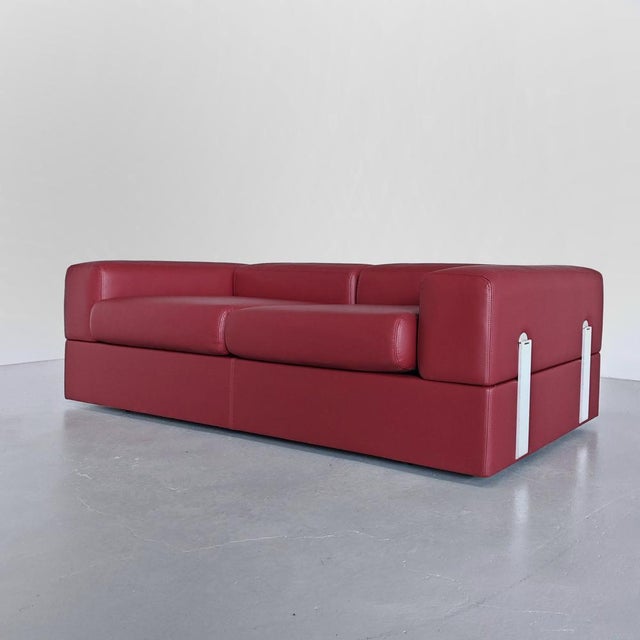 Model 711 Daybed Sofa in Red Leather attributed to Tito Agnoli for Cinova, 1970s, in Restored conditions. Designed 1970 to...