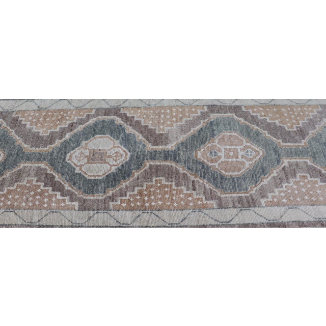 Long Turkish Oushak Runner With Soft Green Field and Beige Medallions For Sale - Image 13 of 16