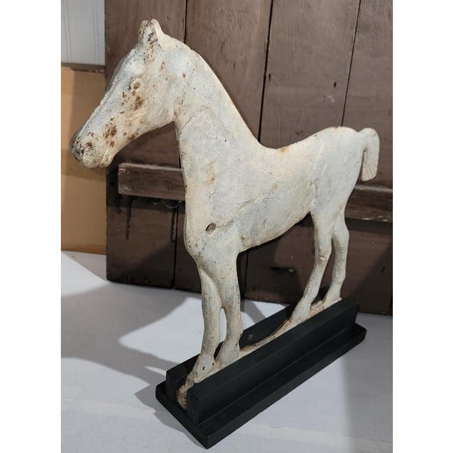 19thc Rocherst NY Windmill weight in original white painted surface. the form is the very best and in great condition....