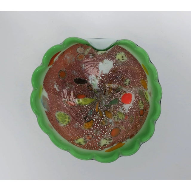 A beautiful Italian Murano art glass bowl in bright green with scalloped edge design, circa mid-20th century, Italy. Art...