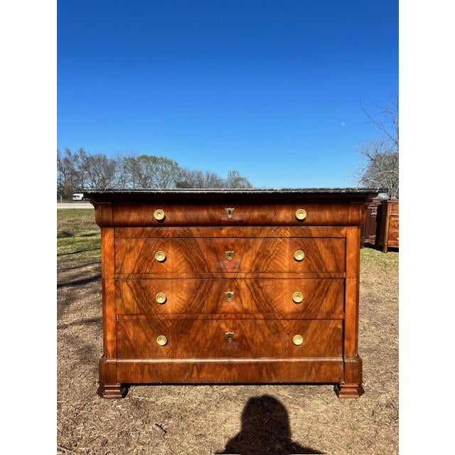 19th Century French Louis Philippe Commode from France. Made of Burl Walnut, with a veined gray Saint Anne marble top...