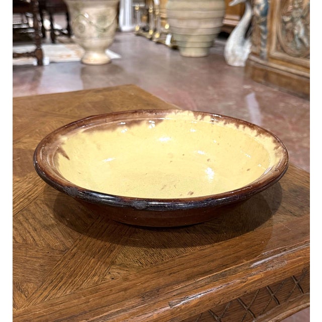 Full of rustic character and warm southern French color, this antique Provençal bowl is a wonderful example of traditional...