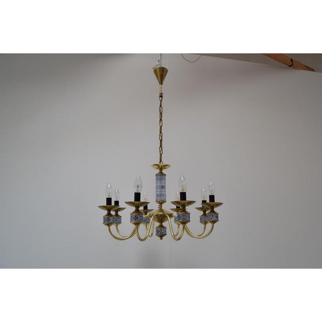Beautiful elegant chandelier of classic design with brass arms and glass accents. Lamps in the shape of candles 8xe14 or...