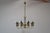 Beautiful elegant chandelier of classic design with brass arms and glass accents. Lamps in the shape of candles 8xe14 or...