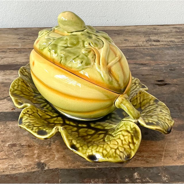 Embrace the charm of the French countryside with this exceptional vintage majolica Sarreguemines lidded melon bowl. This...