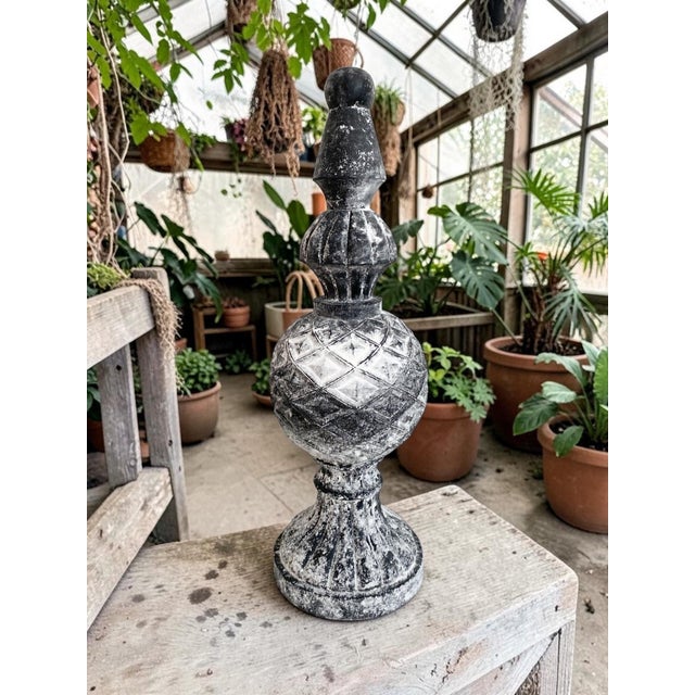 This product is a large weathered resin finial statue, measuring 19.5 inches in height. It features a French Country...