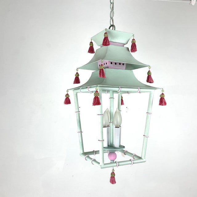 A striking and playful mid-century piece, this 1960s pagoda-style lantern chandelier blends Chinoiserie elegance with...