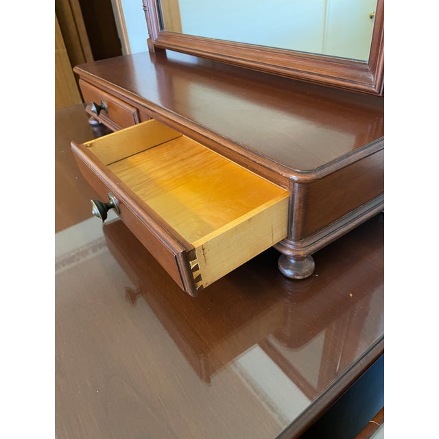 This beautiful Vintage ‘Collector Finish’ Cherry Wood Men’s Valet with adjustable mirror by Pennsylvania House (Item #362)...