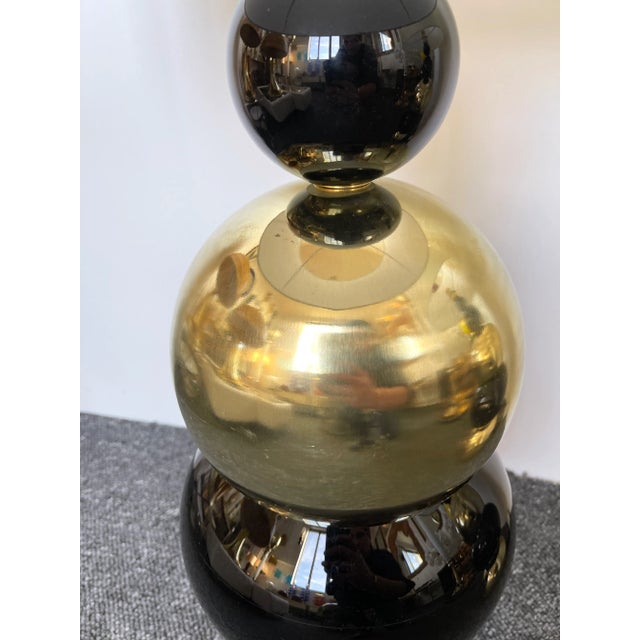 Pair of table or bedside brass lamps and black Murano glass. Contemporary work from a small italian artisanal workshop. In...