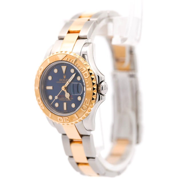 Rolex Yacht-Master Ref. 169623 features a 29mm stainless steel case, a distinctive 18K yellow gold rotating bezel, and a...