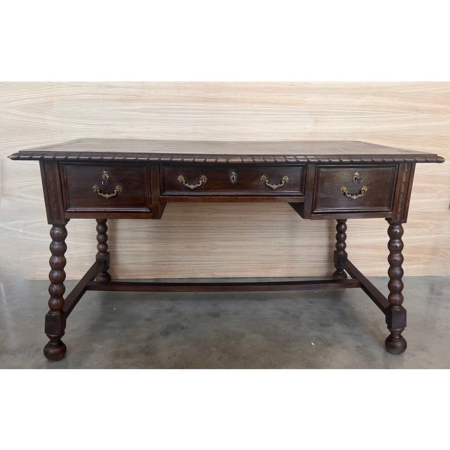 Handsome oak library piece that can be used as a desk or Work table. Made of oak having carved gadrooned edges. Carved on...