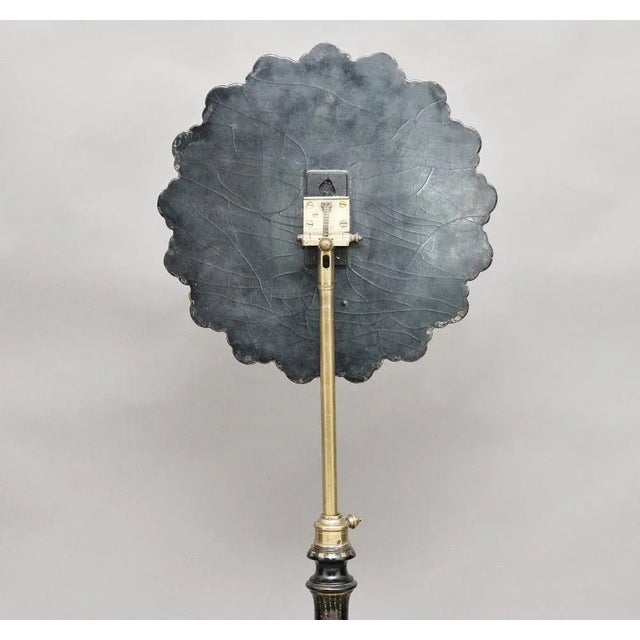 19th Century painted Chinoiserie occasional / tripod table, having a shaped top with painted floral decoration, the column...