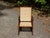 Vintage Mid Century Child Size Small Rocking Chair Rocker with solid Walnut frame and caned seat and back. Dimensions:...