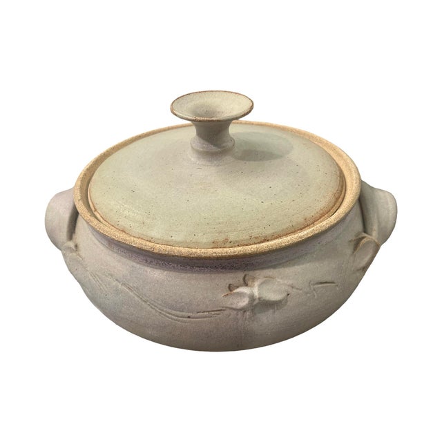 We have for your consideration a very beautiful lidded ceramic bowl. artist is unknown but signed but can’t make out the...