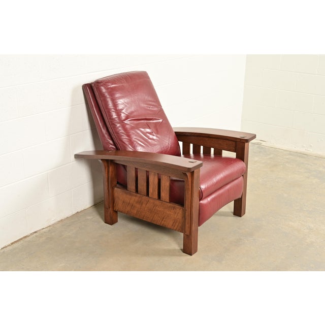 A gorgeous Mission or Arts & Crafts style bow arm reclining lounge chair By L. & J.G. Stickley USA, Circa Late 20th...