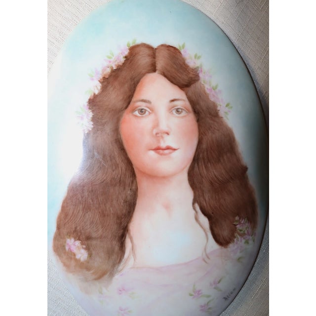 Up for sale is a wonderful antique 19th century original porcelain portrait painting. The piece is done in a large oval...