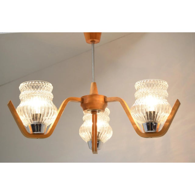 Made in czechoslovakia. Made of glass,wood 3x e27 or e26 socket us wiring compatible. Re-polished. Fully functional. Good...