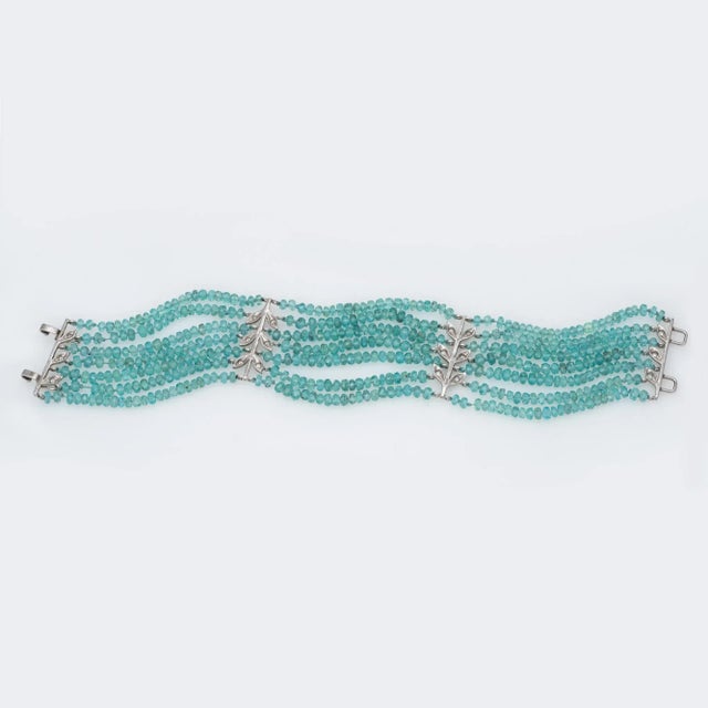 This is part of Chairish’s Fine Jewelry assortment. Finely detailed pre-owned Cathy Waterman 7 strand aquamarine & diamond...