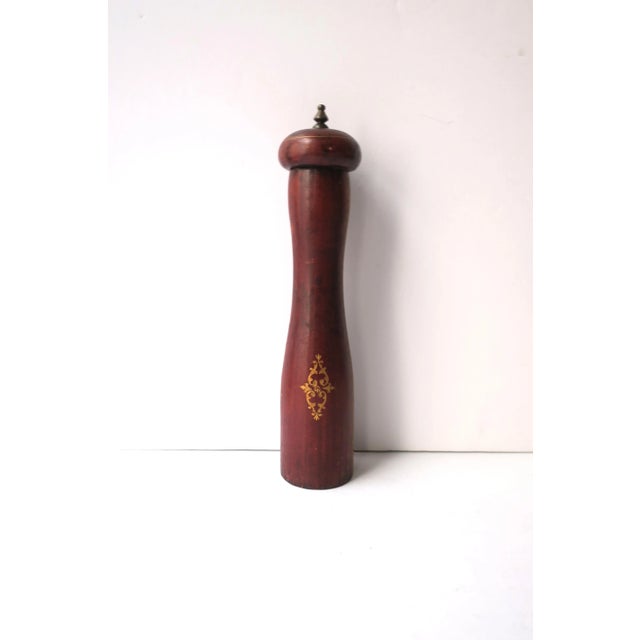 An Italian leather wrapped pepper mill with gold embossed detail, circa mid-20th century, Italy. A great piece for a...