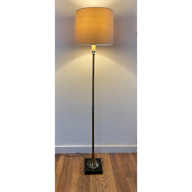 Mid-Century Modern floor lamp in a sculptural hunting horn form by Chapman, retaining its original 1972 Chapman label....