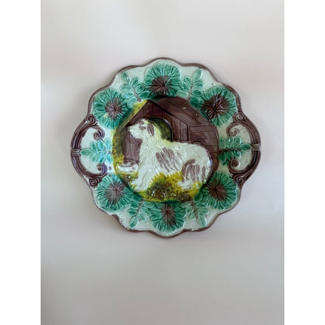 Three (3) vintage Majollica dog themed plates. Details: Victorian era (late 1800's). Set of three (3) Majollica plates...