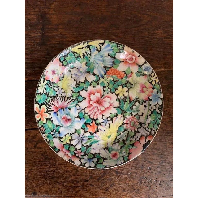 Beautiful porcelain plate "Millefleur". Polychrome jug plate decorated with millefleurs, Asian ceramic. Many coloured...