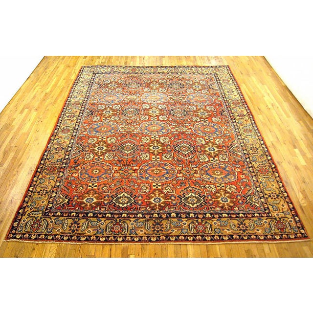 Antique Persian Sultanabad rug, room size, circa 1900. A one-of-a-kind antique Persian Sultanabad oriental carpet with a...