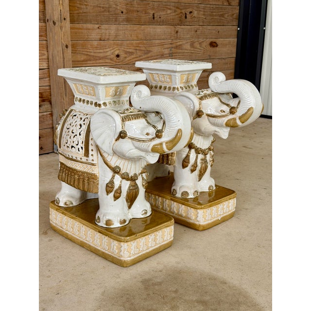 Absolutely fabulous pair of vintage ceramic elephant garden seats or pedestals featuring richly detailed ceremonial...