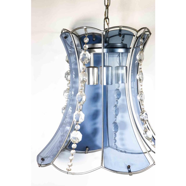Crystal blue chandelier is an original design lamp realized in the half of 20th century by Italian designer. A very...