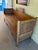 Wooden bench opens to a daybed.