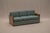 Exceptional Art Deco three-seat sofa, distinguished by its striking burlwood armrests, architectural proportions and...
