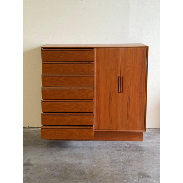 Authentic Mid-Century Modern teak gentleman’s chest by Westnofa, Norway, dating to the 1960s. Crafted from warm, richly...