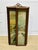 An elegant antique three-panel folding fireplace screen, likely dating to the late 19th century, featuring a continuous...