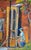 Figurative Vibrant Painting of a Figure Painting on an Easel Outside in a Gardenscape With a Brick Building in the Background For Sale - Image 3 of 8