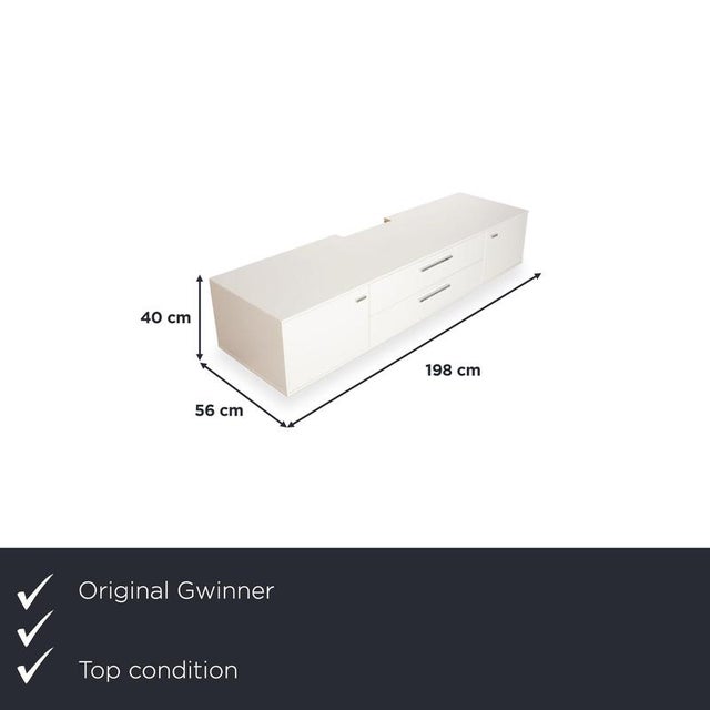 Here you get a sideboard from the MC 906 series by Gwinner, which, with its white front and low, elongated shape, adds a...