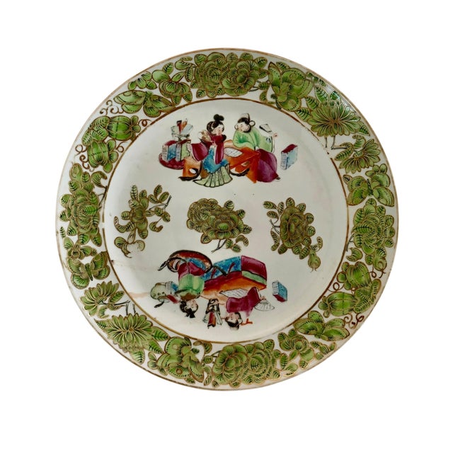 A beautiful pair of 19th century Chinese Export Famille Verte porcelain plates, expertly hand decorated in the vibrant...