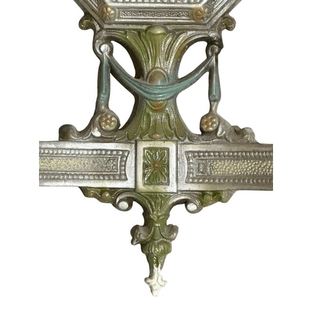 13” tall 10” wide 4” deep Good condition Step back in time with this magnificent antique double arm wall sconce, an...