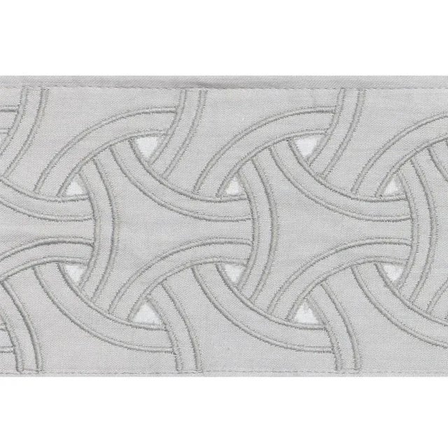 Smart and stylish, this interlocking applique design adds a couture touch to upholstery, pillows or window treatments....