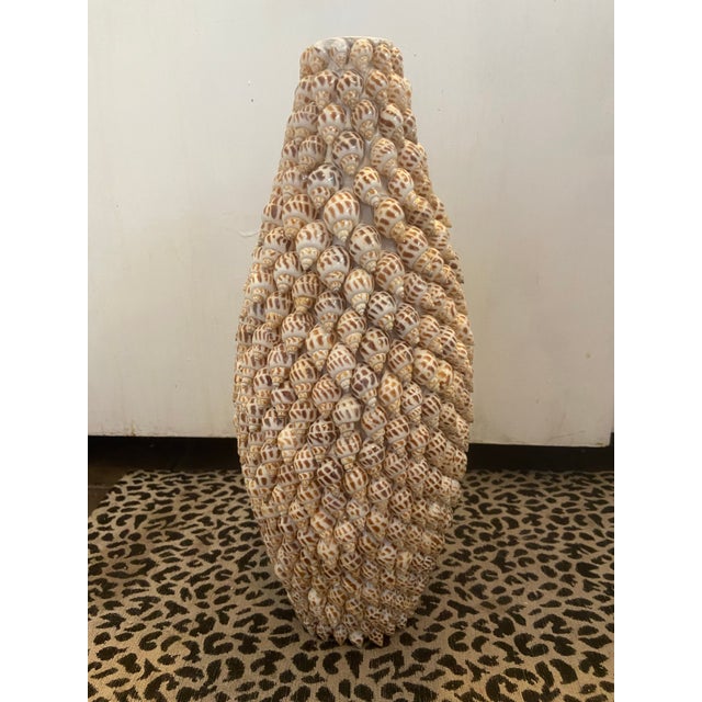 Vintage Seashell Encrusted Vase. This coastal chic vase was hand made in the 1980s. The shells are on top of a...
