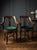 A rare and exceptional matching pair of fully refurbished Hungarian vintage Art Deco barber and salon armchairs, featuring...