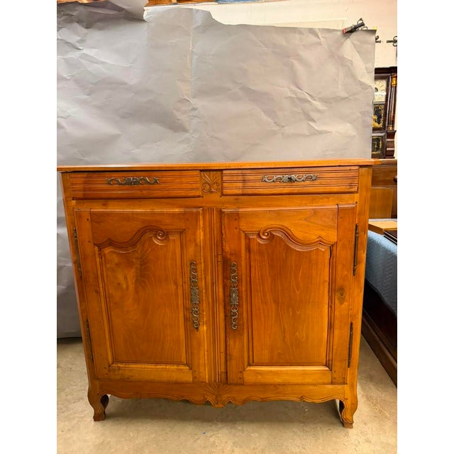 A beautiful and highly original French Country haut buffet (high buffet) dating to the late 18th century, circa 1790....
