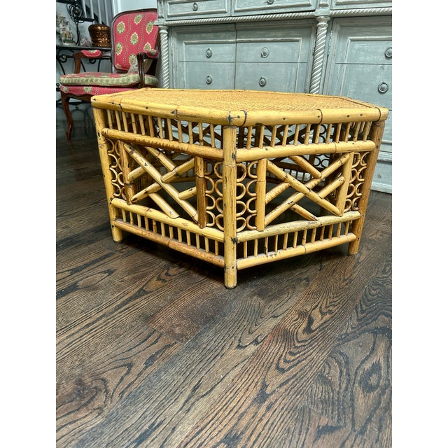 A charming Brighton Pavilion style bamboo and cane hexagonal coffee table featuring a woven cane top and decorative...