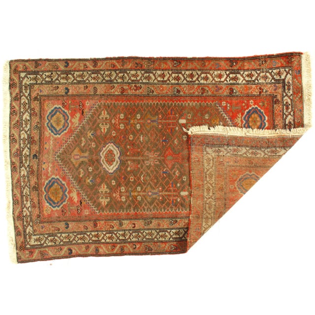 Original Persian antique Malayer lamb's wool on a cotton foundation. Hand-spun wool rug. Vegetable dyed. This rug has a...