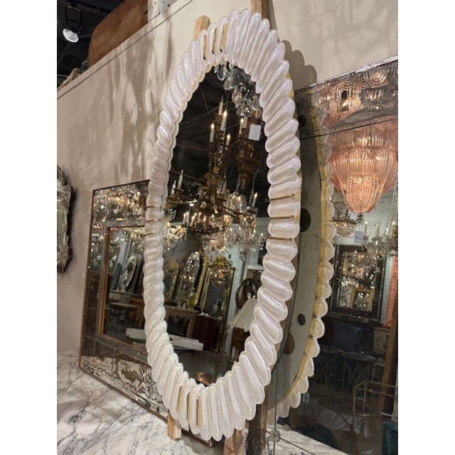 Modern Murano oval "bubble" mirror in frost white. These mirrors are perfect for anchoring a foyer, flanking a console, or...