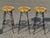 Set of 3 solid iron heavy stools please look at pictures for overall details and measurements feel free to email with and...