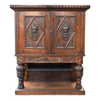 Neo-Renaissance Oak Cabinet with Lion Heads For Sale