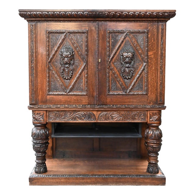 Neo-Renaissance Oak Cabinet with Lion Heads For Sale