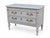 Carved Wood Chests Featuring Two Drawers With Decorative Brass Handles, Fluted Details, And Carved Floral Elements On Legs...