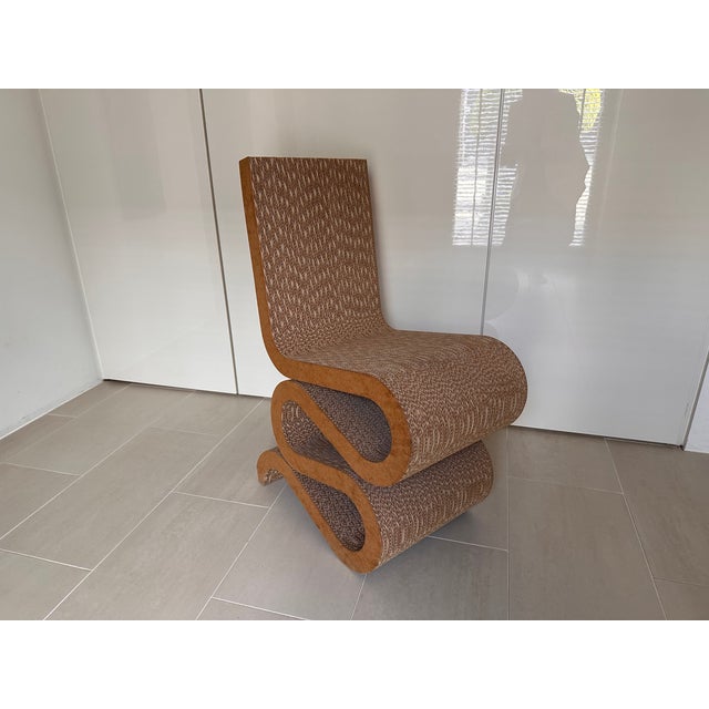 Designed by renowned architect and designer Frank Gehry for Vitra, the Wiggle Side Chair is one of the most iconic pieces...